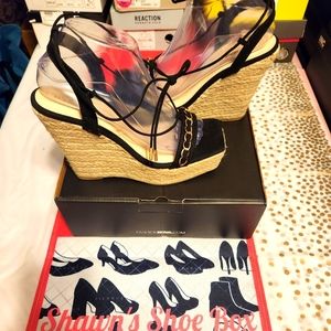 Black and Tan wedge heel sandals with straw fabric sole. Size 10 new never worn